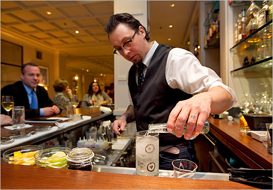 Bartender Todd Maul makes a Bulls eye gin and tonic at Clio. - Credit Boston.com